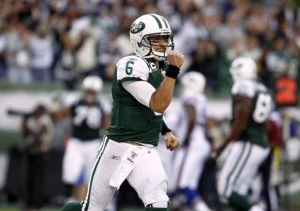Mark Sanchez #6 of the New York Jets celebrates a touchdown Mark Sanchez #6 of the New York Jets celebrates a touchdown