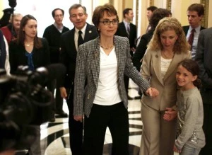 Former U.S. Rep. Gabrielle Giffords (L) is excorted down the hall by Rep. Debbie Wasserman Schultz (D-FL) after she resigned from the House of Representatives Former U.S. Rep. Gabrielle Giffords (L) is excorted down the hall by Rep. Debbie Wasserman Schultz (D-FL) after she resigned from the House of Representatives