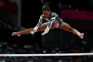 Gabrielle Douglas of the United States competes in the Artistic Gymnastics Women's Uneven Bars final Gabrielle Douglas of the United States competes in the Artistic Gymnastics Women's Uneven Bars final