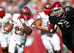 Jawan Jamison #23 of the Rutgers Scarlet Knights out runs Hershey Walton #72 of the Temple Owls Jawan Jamison #23 of the Rutgers Scarlet Knights out runs Hershey Walton #72 of the Temple Owls