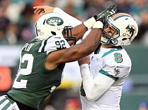 Marcus Dowtin collides with Matt Moore #8 of the Miami Dolphins Marcus Dowtin collides with Matt Moore #8 of the Miami Dolphins
