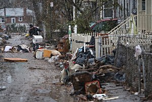Eddie Saman clears out destroyed household belongings from his flood-damaged Staten Island home Eddie Saman clears out destroyed household belongings from his flood-damaged Staten Island home