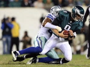 Nick Foles #9 of the Philadelphia Eagles is sacked by Victor Butler #57 of the Dallas Cowboys Nick Foles #9 of the Philadelphia Eagles is sacked by Victor Butler #57 of the Dallas Cowboys