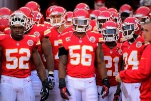 Derrick Johnson #56 of the Kansas City Chiefs wears a black arm band in memory of Jovan Belcher Derrick Johnson #56 of the Kansas City Chiefs wears a black arm band in memory of Jovan Belcher