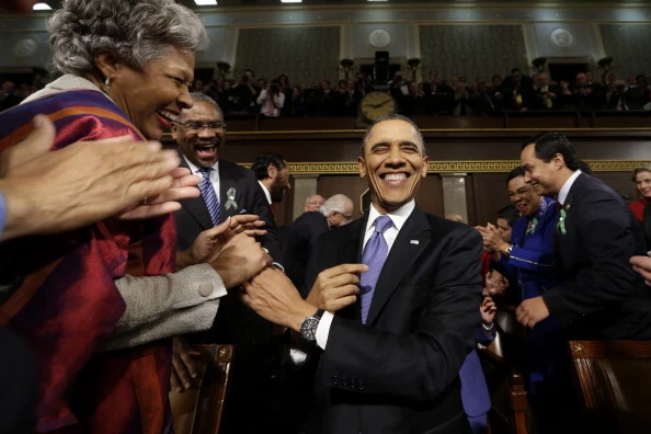 President Barack Obama is greeted before his State of the Union address President Barack Obama is greeted before his State of the Union address