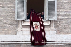 Pope Benedict XVI's personal secretary Monsignor Georg Gaenswein (R) removes the Papal banner from the window after The Pontiff delivered his last Angelus Blessing Pope Benedict XVI's personal secretary Monsignor Georg Gaenswein (R) removes the Papal banner from the window after The Pontiff delivered his last Angelus Blessing