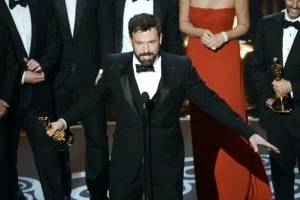 Actor/producer/director Ben Affleck accepts the Best Picture award for Argo onstage along with members of the cast and crew Actor/producer/director Ben Affleck accepts the Best Picture award for Argo onstage along with members of the cast and crew