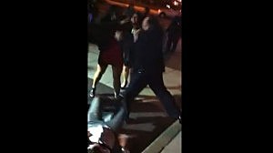 Screen shot of video showing an Elizabeth police officer appearing to punch a woman Screen shot of video showing an Elizabeth police officer appearing to punch a woman