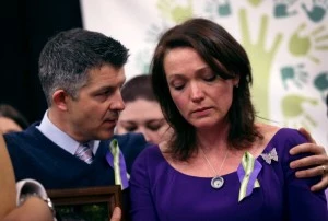 Ian Hockley and Nicole Hockley, parents of Sandy Hook massacre victim Dylan Hockley (6), embrace during a press conference with fellow parents of victims on the one month anniversary of the Newtown elementary school shooting Ian Hockley and Nicole Hockley, parents of Sandy Hook massacre victim Dylan Hockley (6), embrace during a press conference with fellow parents of victims on the one month anniversary of the Newtown elementary school shooting