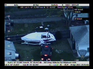 Mechanical device cuts open tarp of boat where where Dzhokhar Tsarnaev was hiding Mechanical device cuts open tarp of boat where where Dzhokhar Tsarnaev was hiding