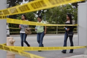 Students leave Santa Monica College, which remains closed for a second day as investigators gather evidence from crime scenes, Students leave Santa Monica College, which remains closed for a second day as investigators gather evidence from crime scenes,