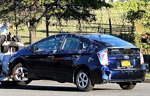 A blue Toyota Prius belonging to Aaron Alexis s towed away by Metro Police from the Washington Navy Yard A blue Toyota Prius belonging to Aaron Alexis s towed away by Metro Police from the Washington Navy Yard
