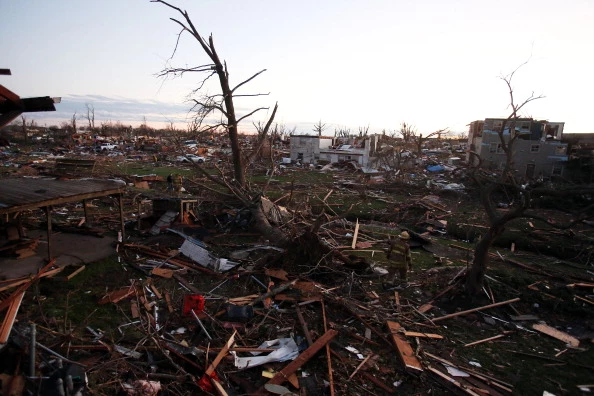Debris covers the area after a tornado struck in Washington, Illinois Debris covers the area after a tornado struck in Washington, Illinois