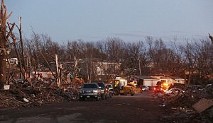 The damage is surveyed along Elgin Avenue after a tornado struck in Washington, Illinois The damage is surveyed along Elgin Avenue after a tornado struck in Washington, Illinois