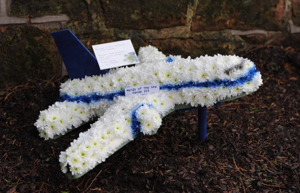 A floral tribute marking the Lockerbie air disaster is left next to the memorial wall in Dryfesdale cemetery on the 25th anniversary of the tragedy A floral tribute marking the Lockerbie air disaster is left next to the memorial wall in Dryfesdale cemetery on the 25th anniversary of the tragedy