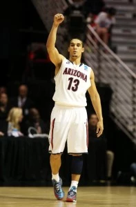 Nick Johnson #13 of the Arizona Wildcats signals in the second half of their game against the Gonzaga Bulldogs Nick Johnson #13 of the Arizona Wildcats signals in the second half of their game against the Gonzaga Bulldogs