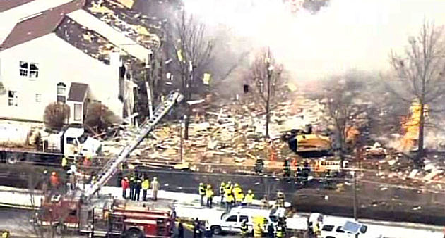 Aerial view of firefighters at the scene of a Ewing home explosion Aerial view of firefighters at the scene of a Ewing home explosion