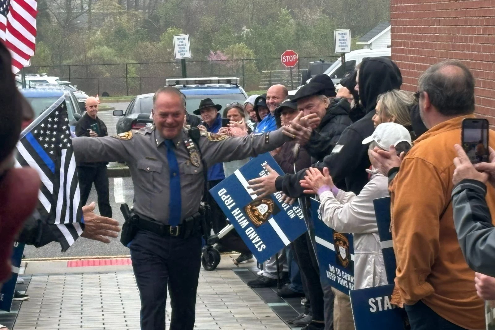 Toms River Police Chief Mitch Little is welcomed back to police HQ after a two-day suspension