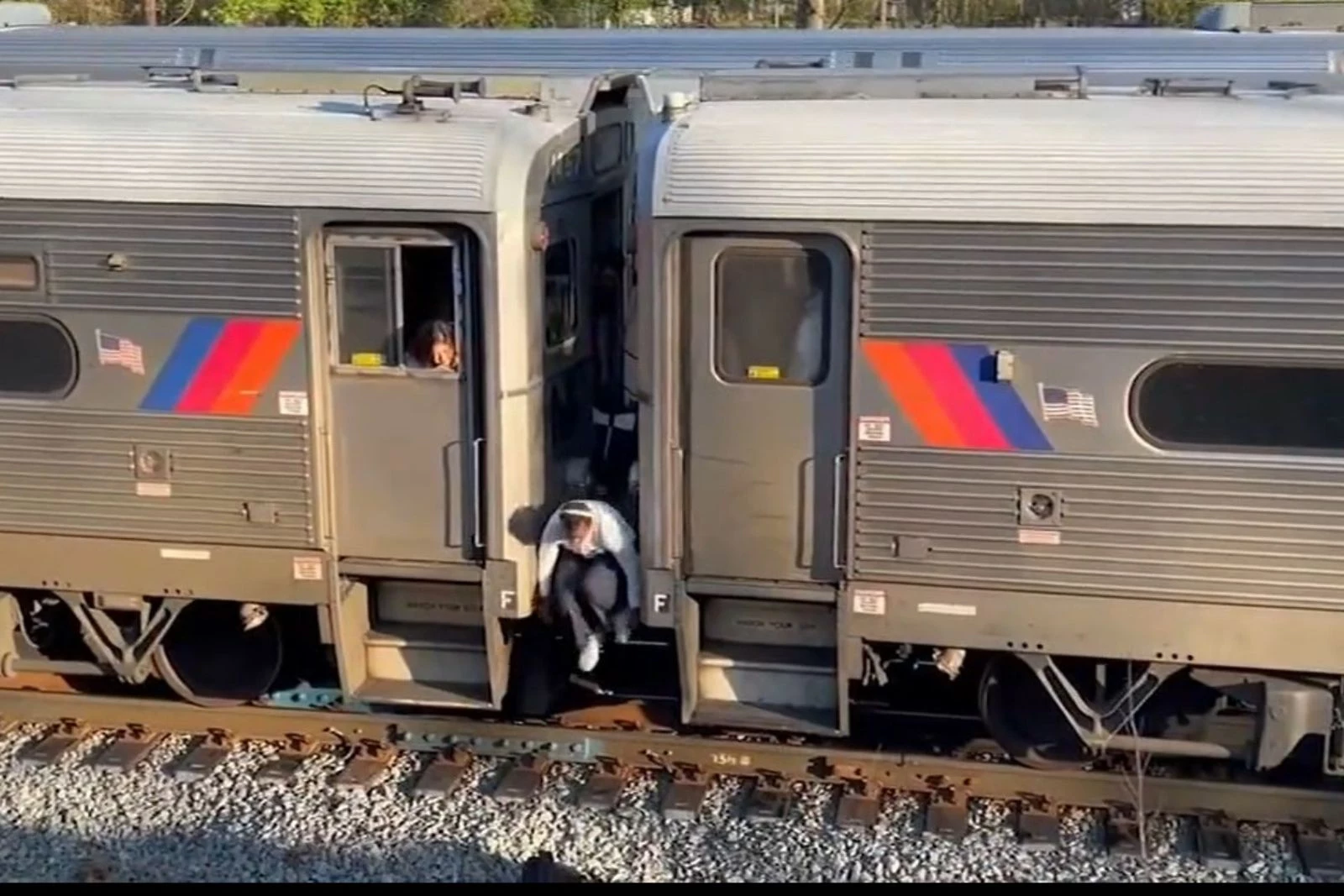 NJ Transit commuter jumps off a stopped train on the Northeast Corridor