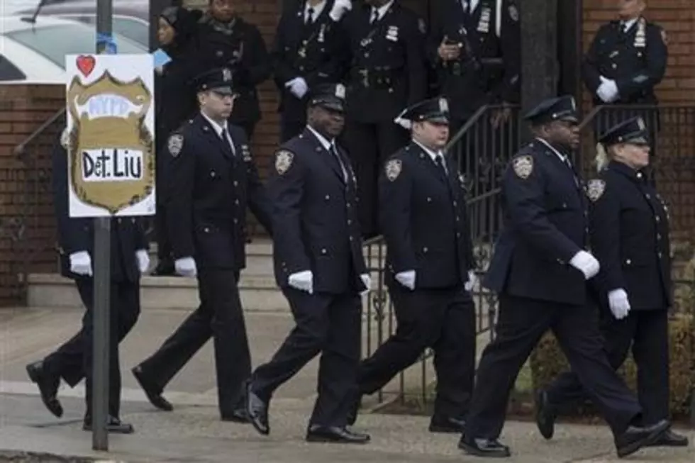 2nd NYPD funeral follows cold, wet day of mourning