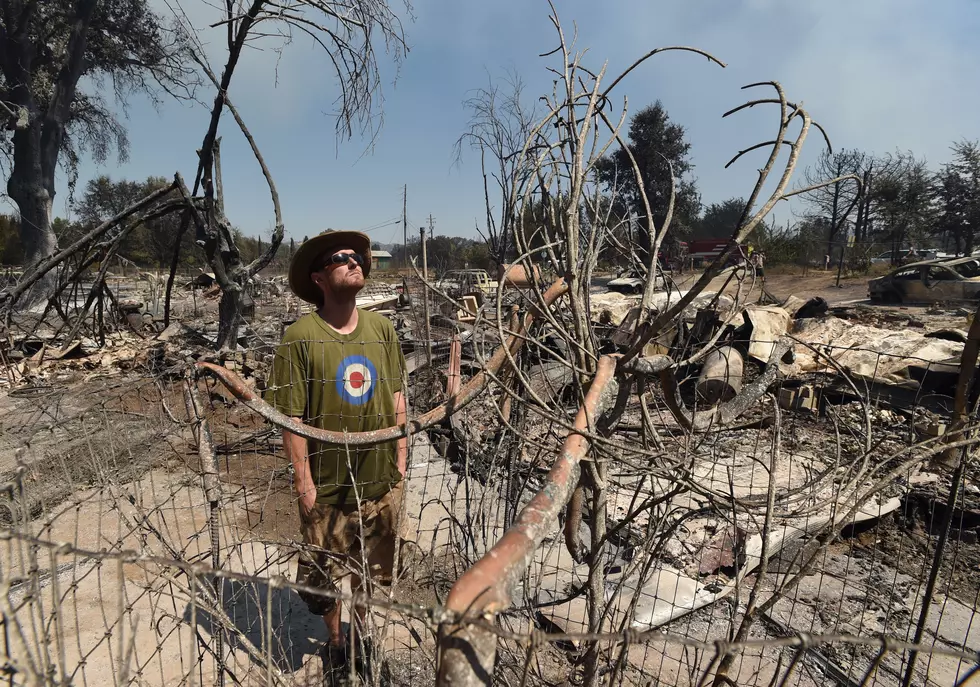California town that wildfires had spared faces new reality